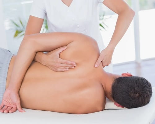 a man getting a massage.