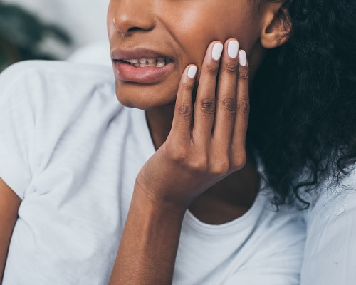 woman with TMJ Jaw pain