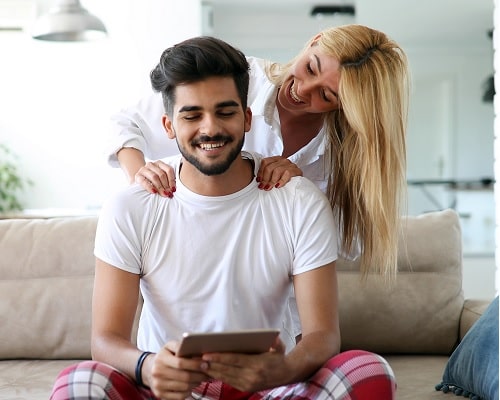 A couple learning how to give great massages